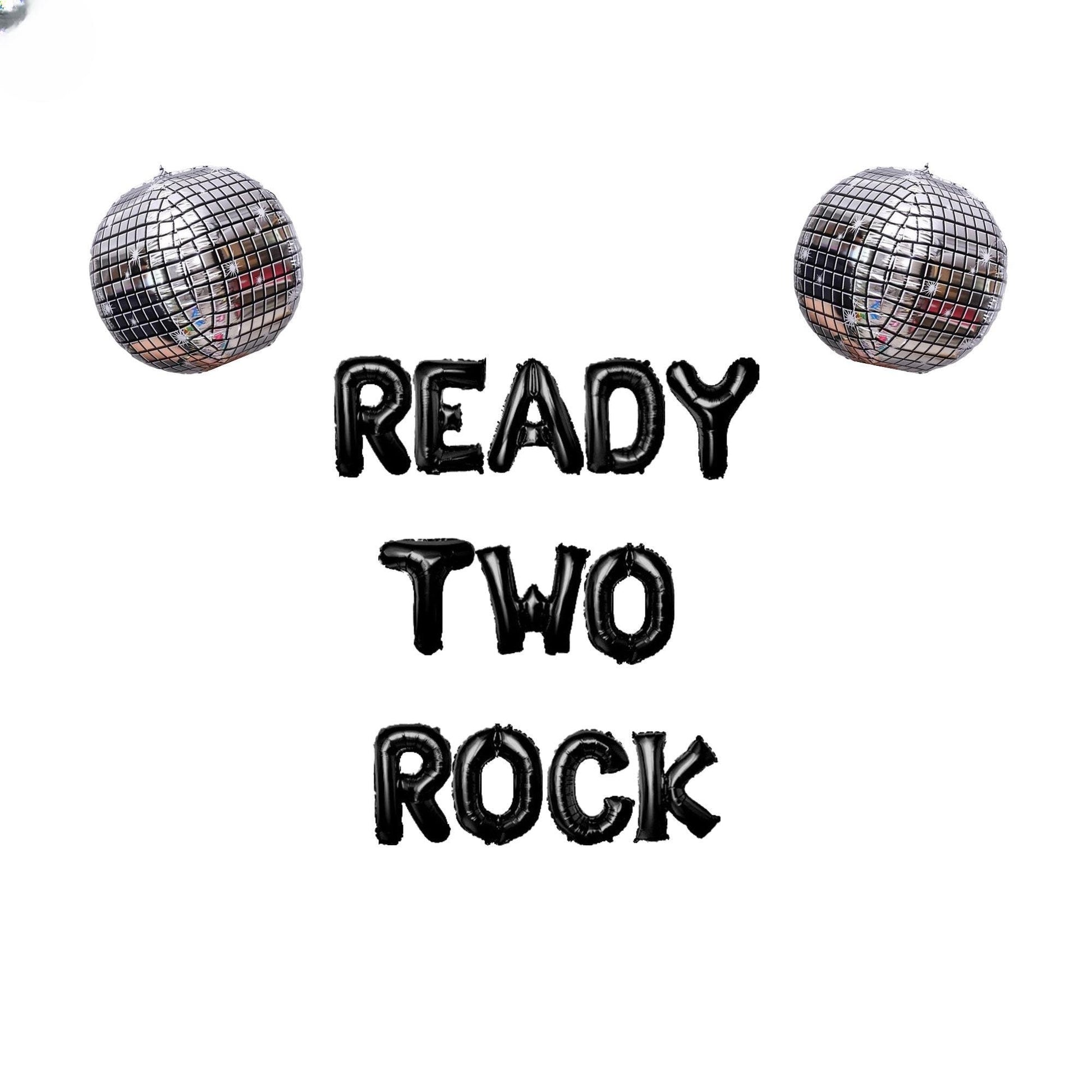 a pair of disco balls with the words ready two rock