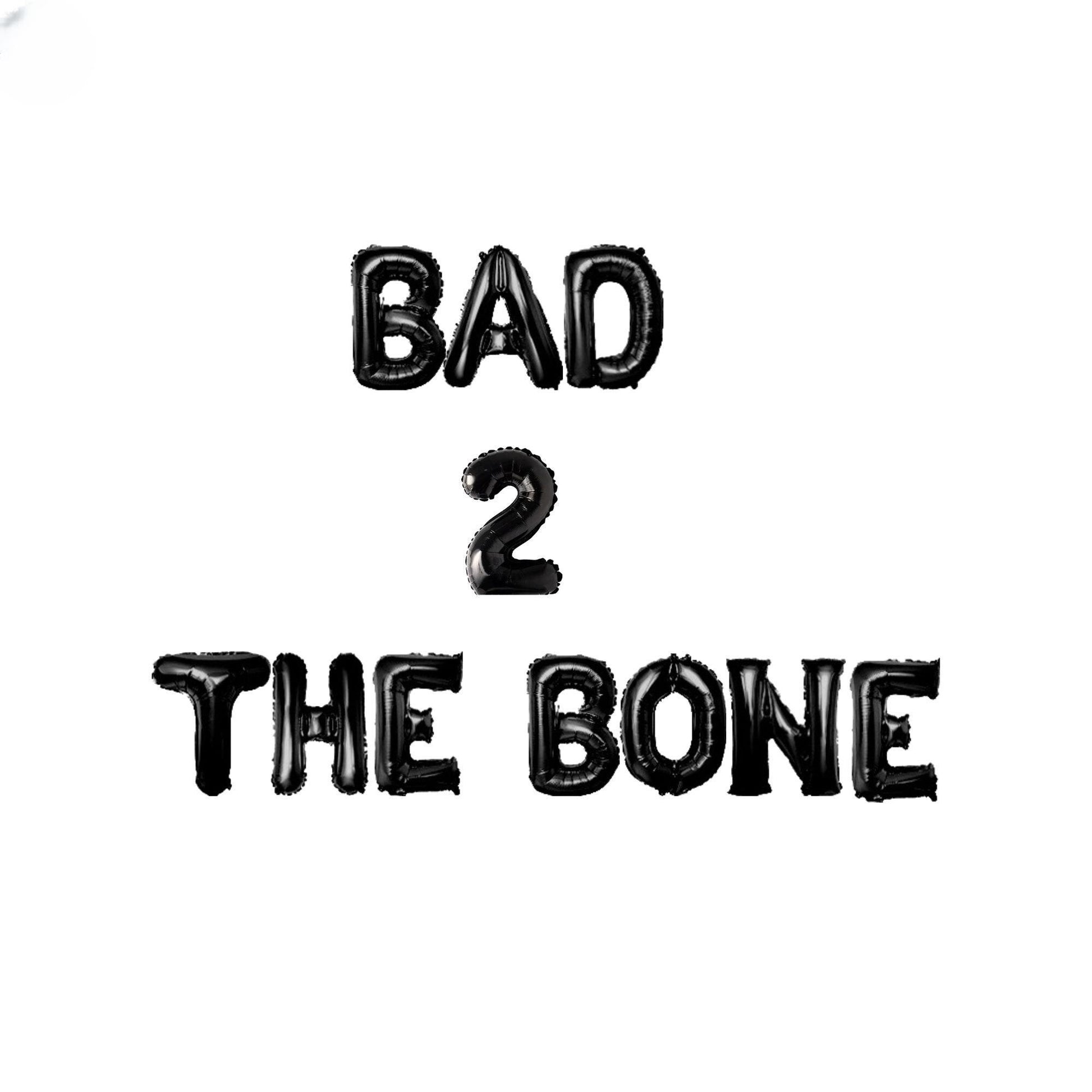 a black and white photo with the words bad 2 the bone