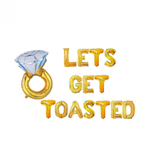 a picture of a diamond ring with the words lets get toasted