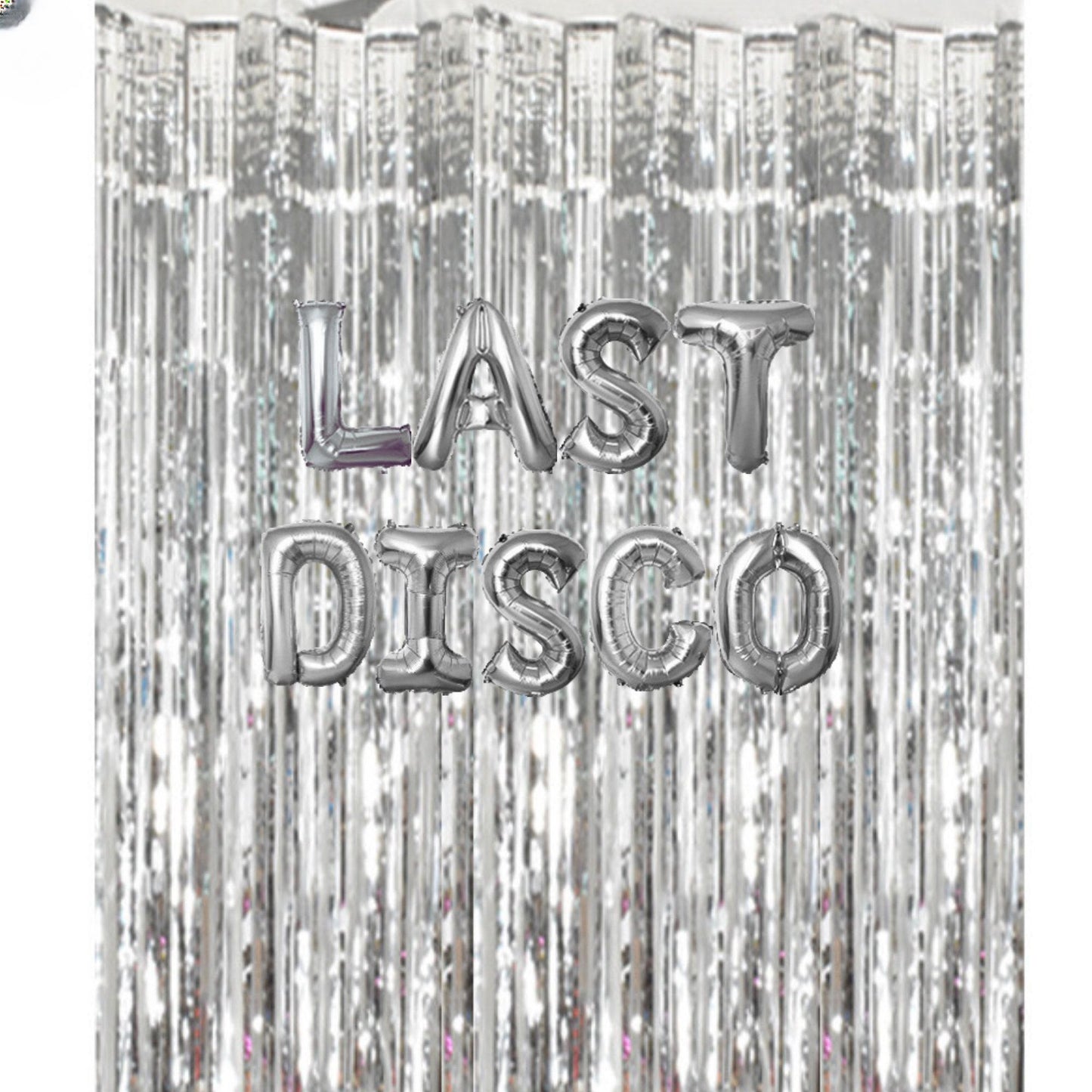 a silver foil curtain with the words last disco on it